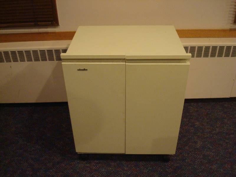 lot 19 image: Metal Minolta Cabinet On Wheels
