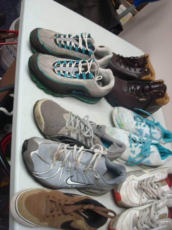 lot 37 image: Bin Filled With Used Tennis Shoes, Some Nikes, Different Sizes