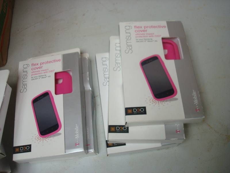 lot 46 image: Box Filled With Unused Pink Samsung Cell Phone Cover Cases, I Believe Around One Hundred