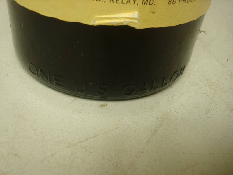 lot 67 image: Large Empty 19 Seagrams 7 Bottle