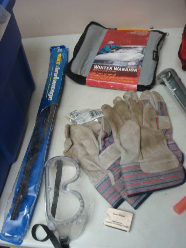 lot 142 image: Blue Bin With Some Mixed Items, Car Safety Items
