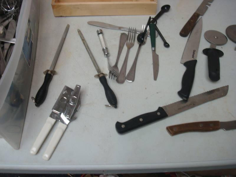lot 144 image: Bin Filled With A Large Amount Of Silverware, Knives, Spoons Forks