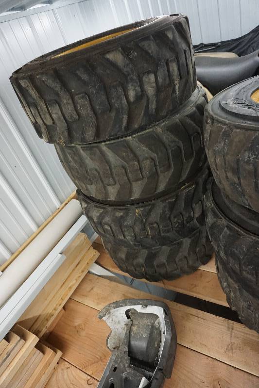 Set of 4 - Caterpillar Brand Skid Loader Skid Steer Tires and Rim