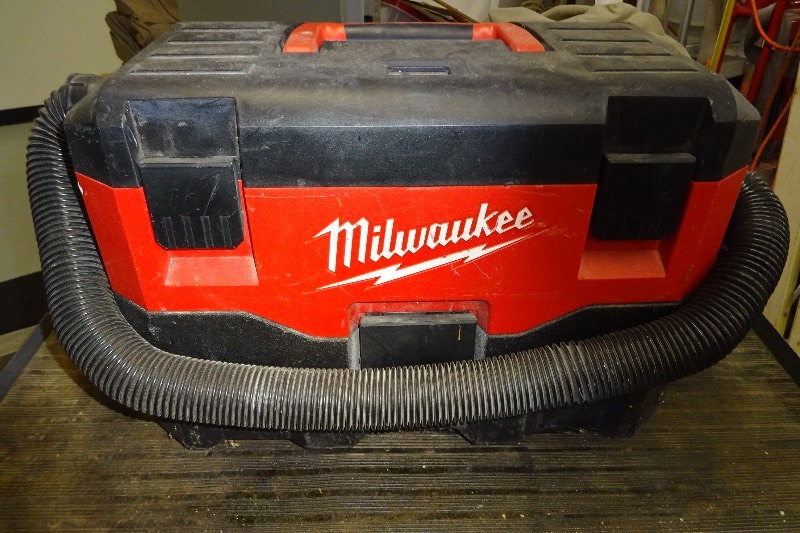 lot 24 image: Milwaukee wetdry vacuum 18 volt