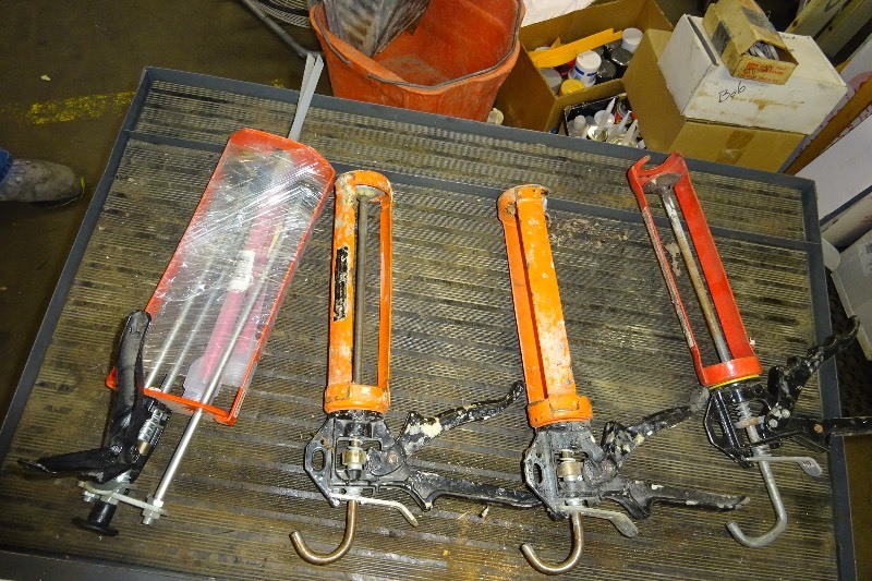lot 70 image: 3 caulk guns
