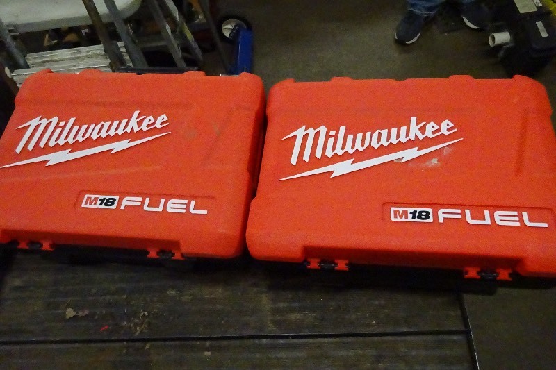 lot 105 image: 2 empty Milwaukee cases