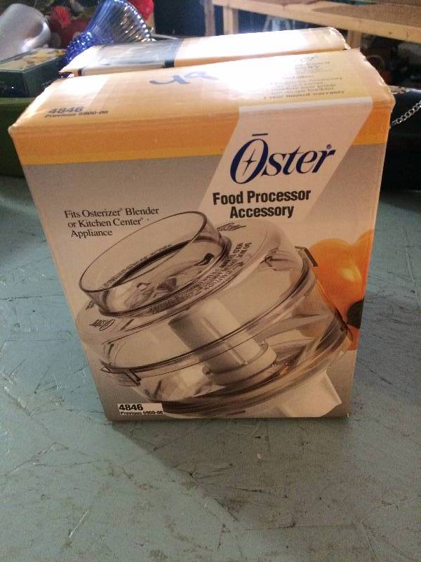lot 49 image: Oster food processor accessory