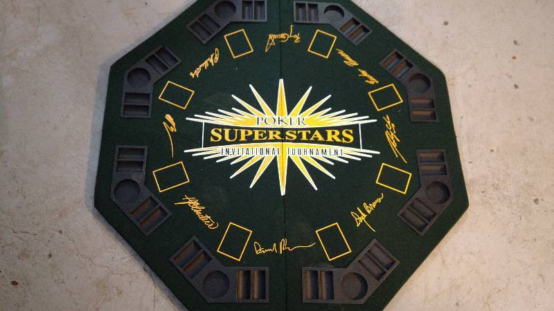 lot 92 image: dart board and table top poker table