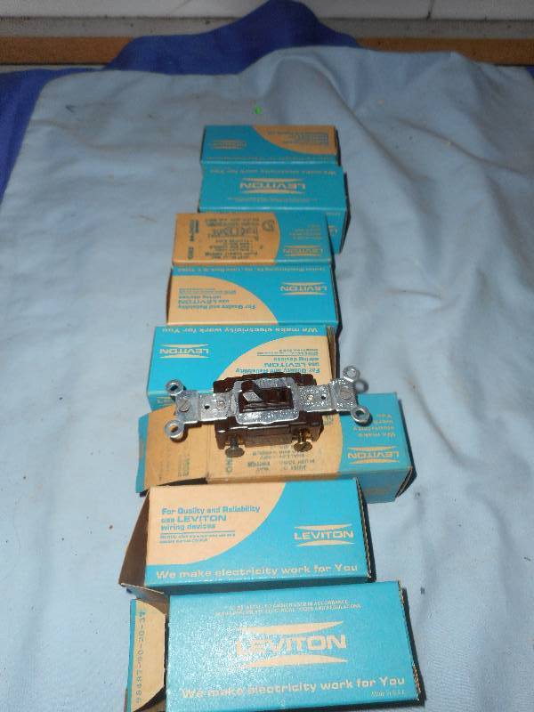 7 LEVITON LIGHT SWITCHES