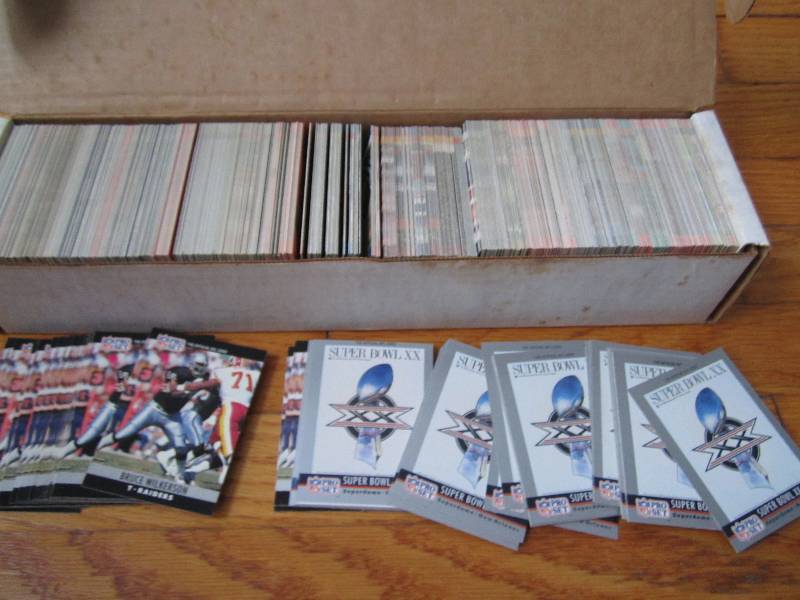 Box of 1990 Proset Football cards...