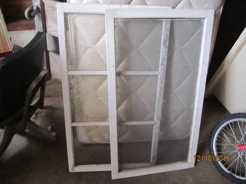 lot 21 image: Window and screen, 25 x 44 outer tr...