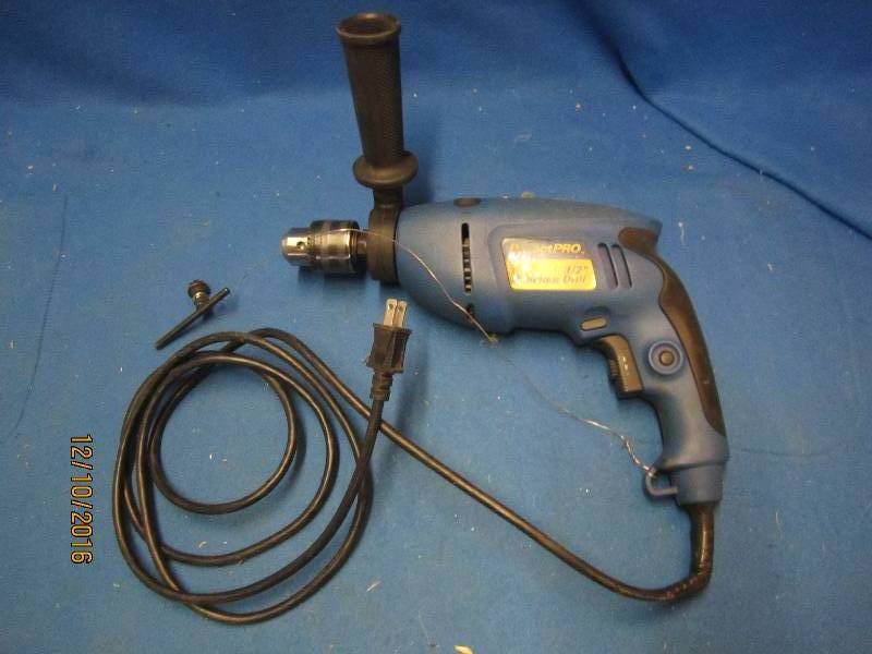 lot 35 image: 12 Hammer drill...