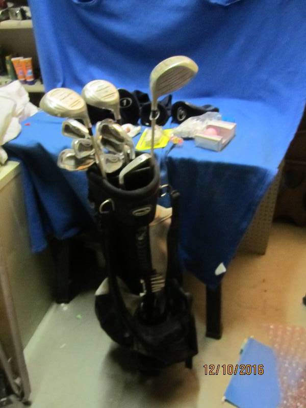 lot 55 image: Large set of golf clubs and bag and...