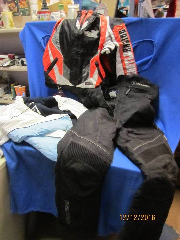lot 73 image: Polaris snow pants M and coats L...