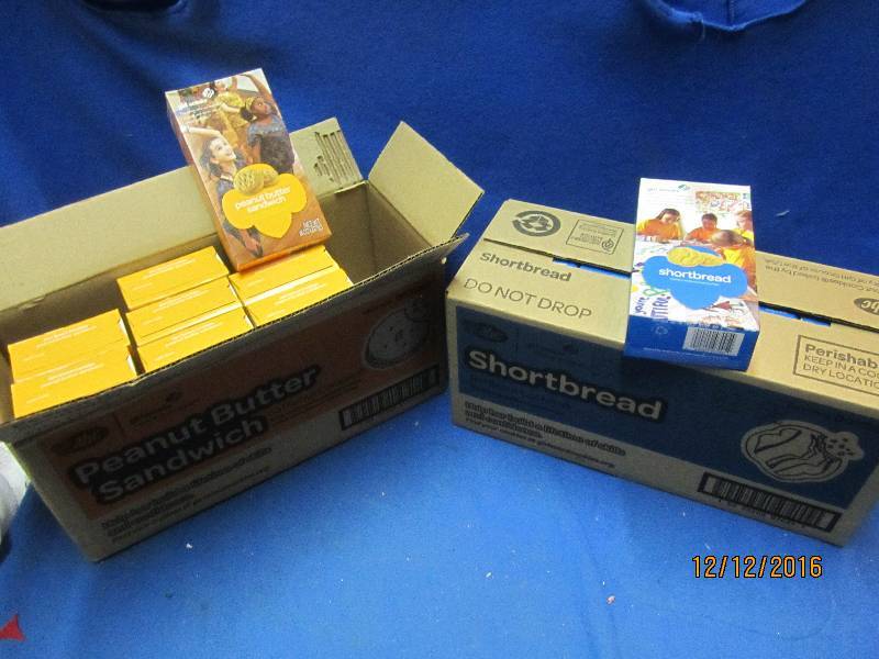 lot 76 image: Full and partial case of girl scout...