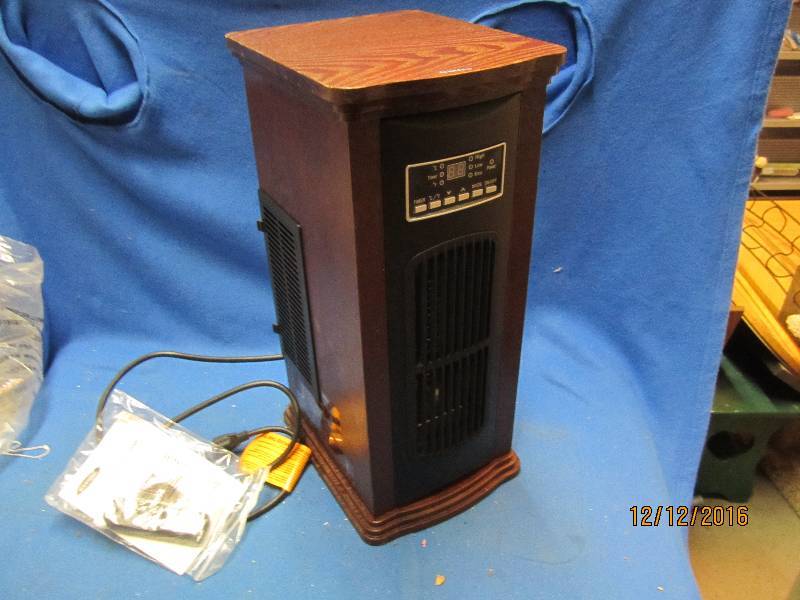 lot 80 image: Store demo model space heater...