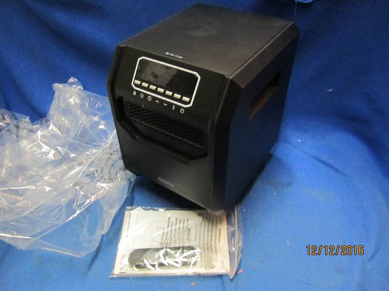 lot 84 image: Like new space heater out of box...