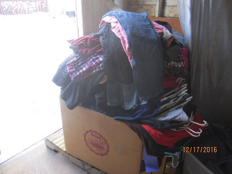 lot 110 image: 4 x 4 foot pallet filled with cloth...