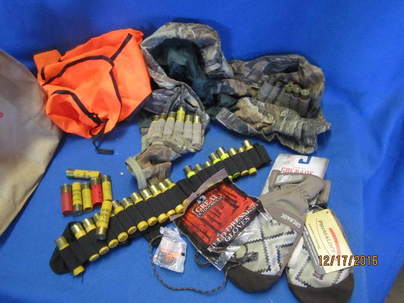 lot 113 image: Hunting vest and belt filled with s...