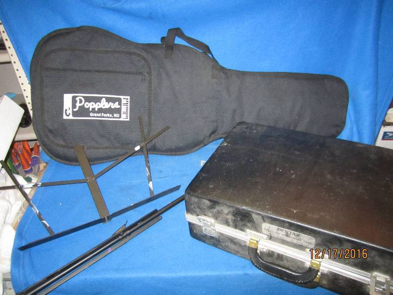 lot 129 image: Guitar case, music stand and vintag...