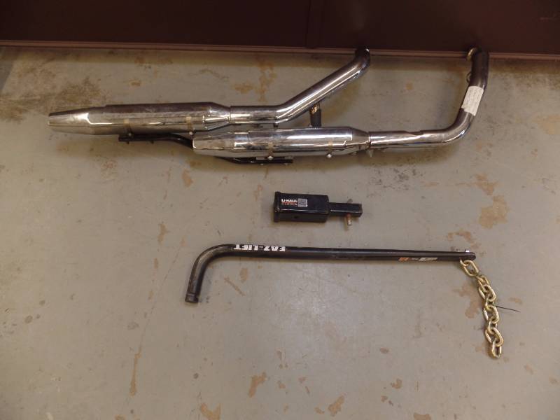 Harley Dual Exhaust Pipes and Tow Equipment