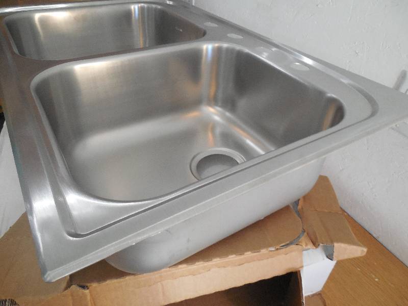 lot 8 image: Elkay Neptune Drop-In Stainless Steel 33 in. 4-Hole Double Bowl Kitchen Sink