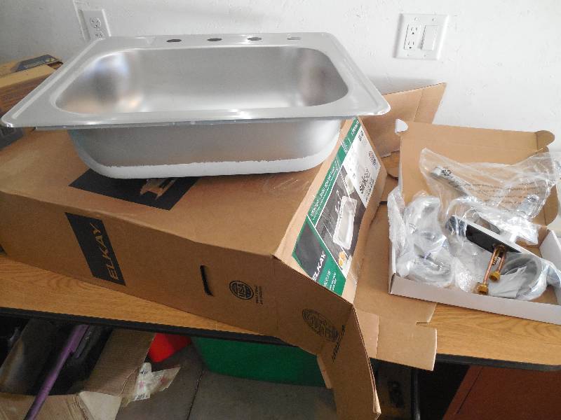 lot 12 image: Elkay All-in-One Top Mount Stainless Steel 25 in. 4-Hole Single Bowl Kitchen Sink