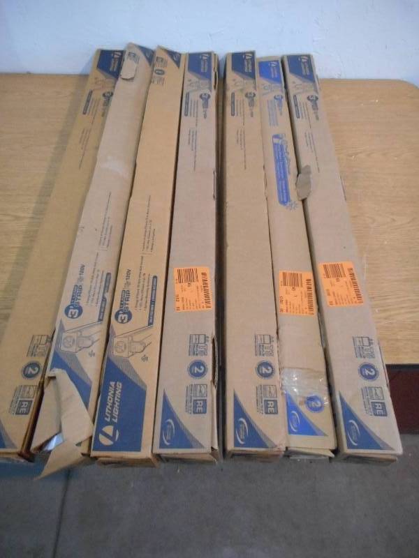 lot 17 image: (7) Lithonia Lighting Mini Strip 1-Light White Fluorescent Utility Light