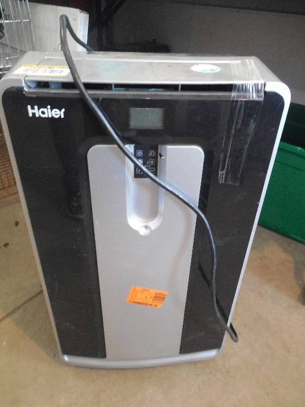 lot 21 image: Haier 10,000 BTU 350 sq. ft. Cool Only Portable Air Conditioner with 80 PintDay Dehumidification Mode