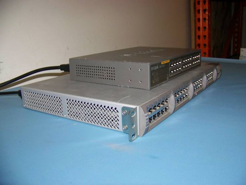 lot 59 image: (1) PowerDsine, 6524, 24-Port Switch  Switcher and (1) D-Link, DGS-1024D, 24-Port Switch  Switcher