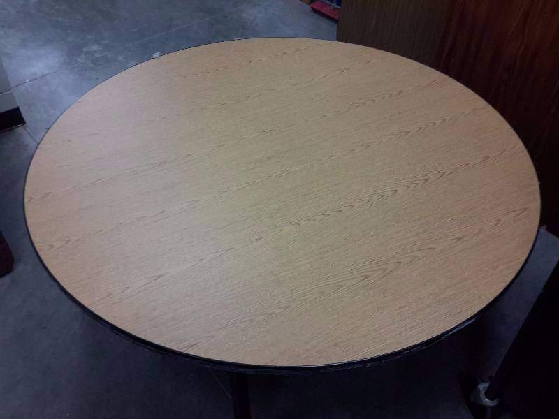 60 in Round simulated wood top tables..