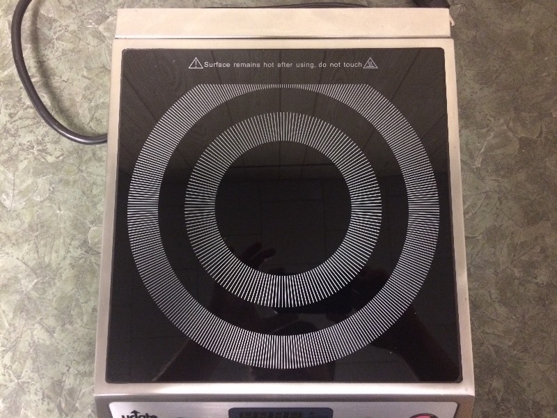 lot 7 image: UPDATE INTL INDUCTION COOKER HEATING ELEMENT