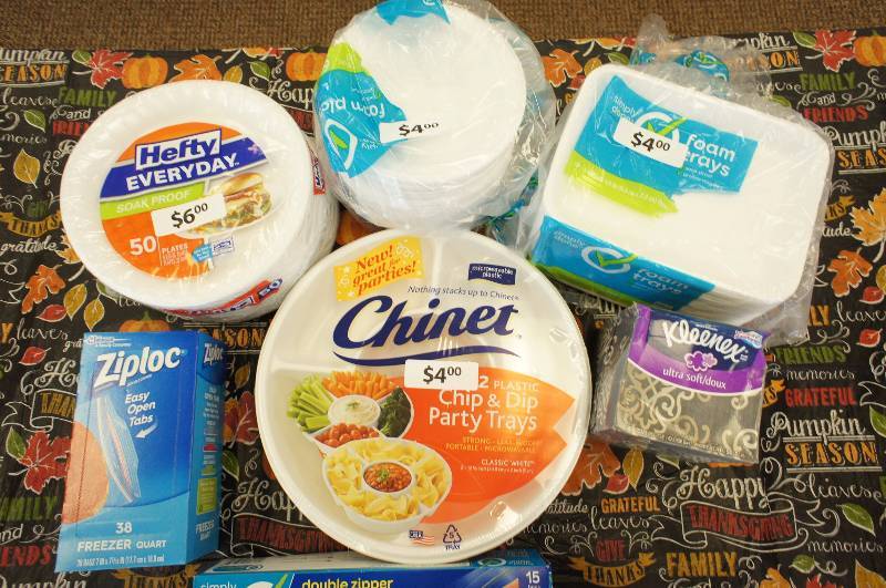 lot 31 image: Large Lot of New Assorted Kitchen Supplies - Foam Plates , Freezer bags , Aluminum Foil, and Kleenex