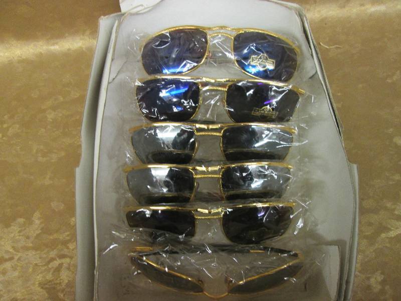 lot 99 image: gold tone sunglassesand red frame s...