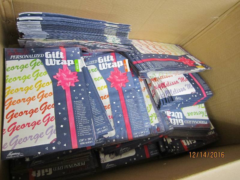 lot 89 image: Large lot of personalized gift wrap...