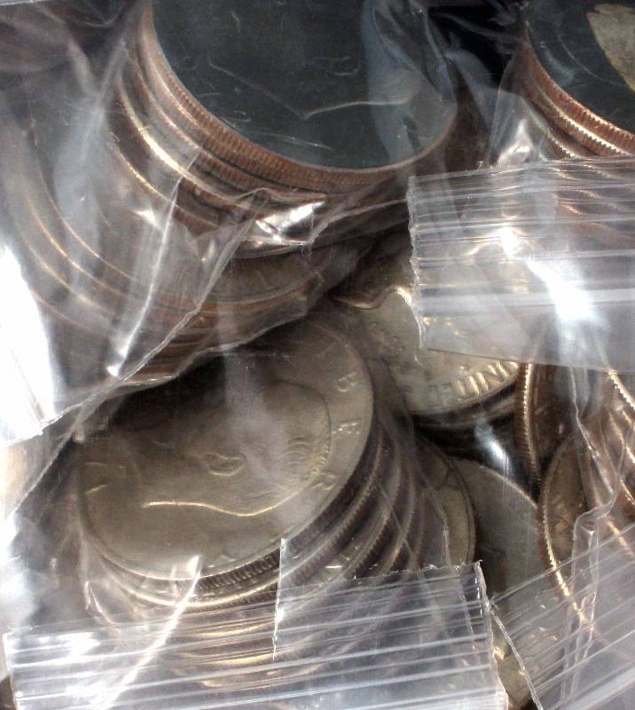 LARGE GROUP OF 100 EISENHOWER CLAD DOLLARS MIXED DATES