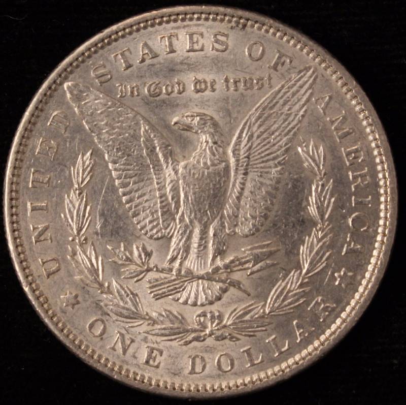 1885 MORGAN SILVER DOLLAR AU