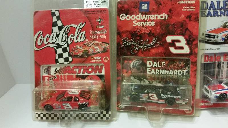 lot 17 image: Lot of (4) Action Racing Collectables 164th Scale Dale Earnhardt Collectable Cars