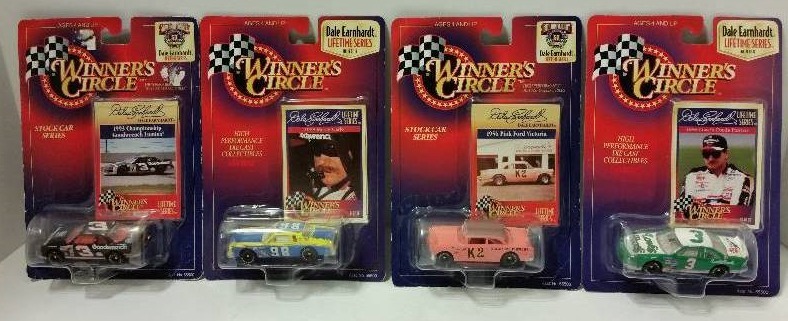 lot 84 image: Lot of (4) Winners Circle 164th Scale (Matchbox) Dale Earnhardt Cars - In Original Packaging