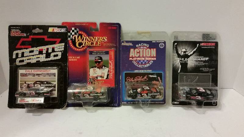 lot 121 image: Lot of (4) Winners Circle and Action Collectables 164th (Matchbox) Dale Earnhardt Die Cast Metal Cars - See Pictures