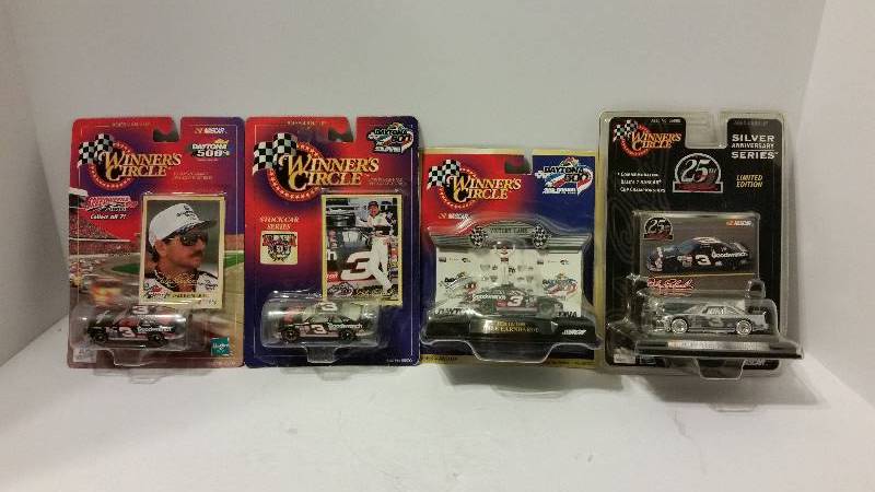 lot 118 image: Lot of (4) Winners Circle 164th Scale Dale Earnhardt Die Cast Metal Cars - See Pictures