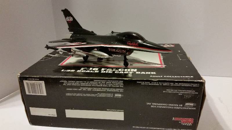 lot 131 image: Racing Champions GM Goodwrench Racing Dale Earnhardt 132nd Scale F-16 Falcon Coin Bank