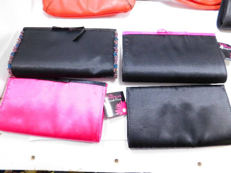 lot 14 image: Lot of Purses & Clutch Purses - Prada, Guess, Etc...