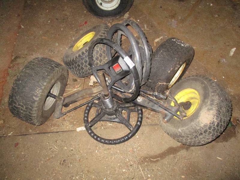 lot 304 image: Steering Wheels & Front Axels