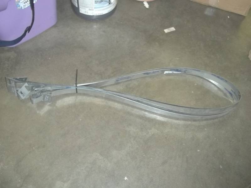 lot 29 image: 8 Galvanized Tank Tie down straps