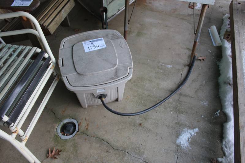 lot 1759 image: Garden Hose Holder w Hose