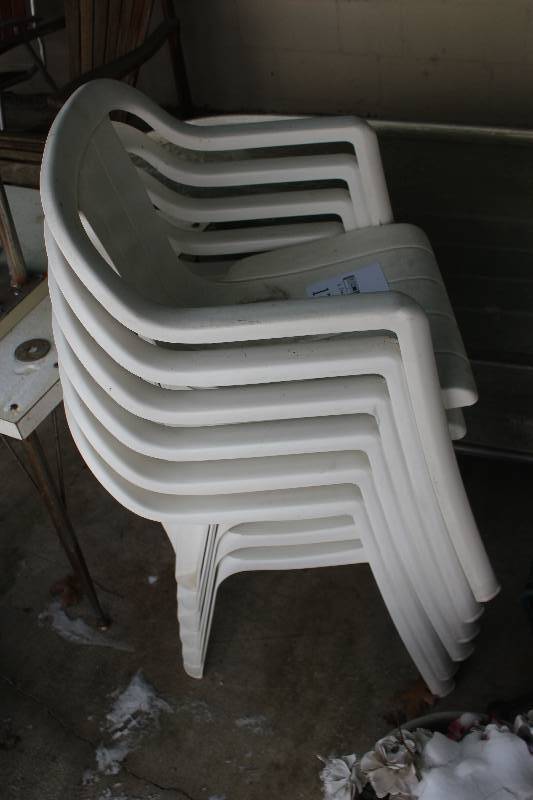 lot 1761 image: Lot of (6) White Plastic Stackable Patio Chairs