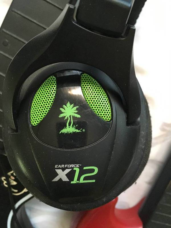 lot 79 image: 2 Guitar Hero accesories & Turtle Beach Headset