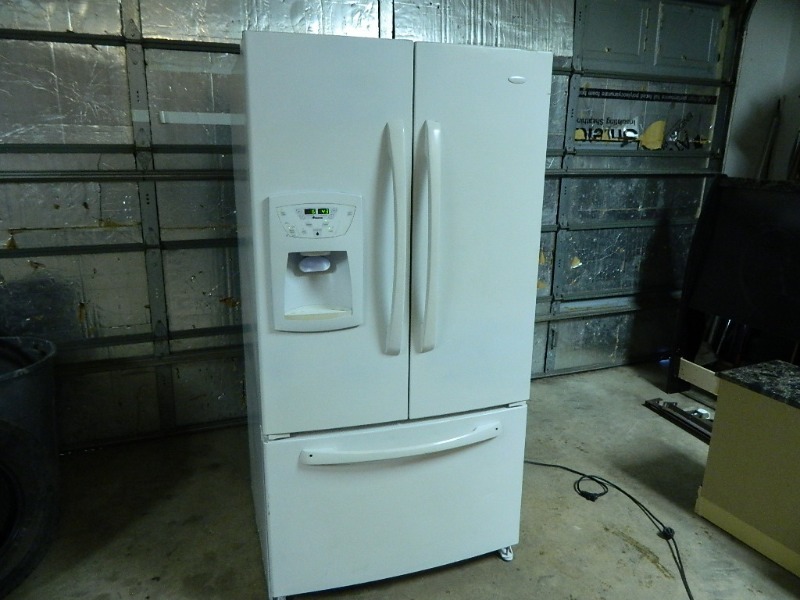 lot 33 image: Amana Refrigerator