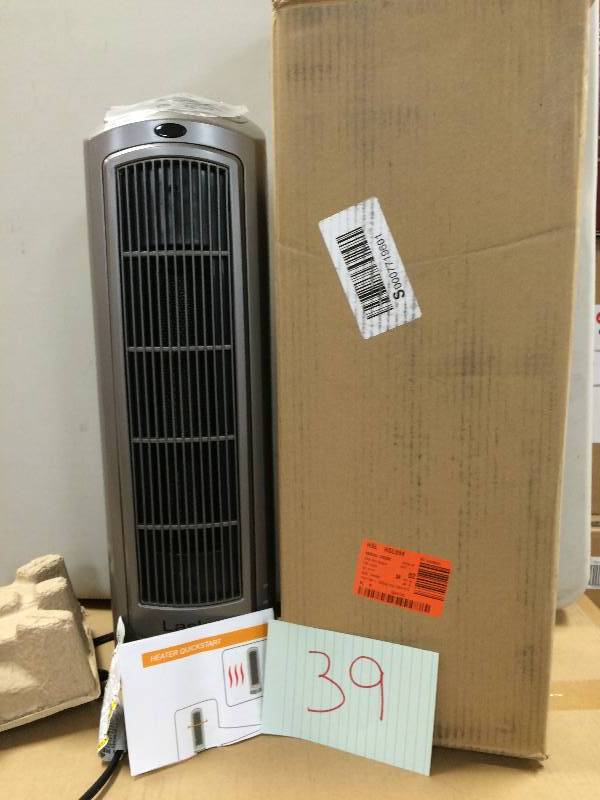 lot 146 image: Lasko 23 in. 1500-Watt Ceramic Tower Heater with Digital Display and Remote Control Never Used